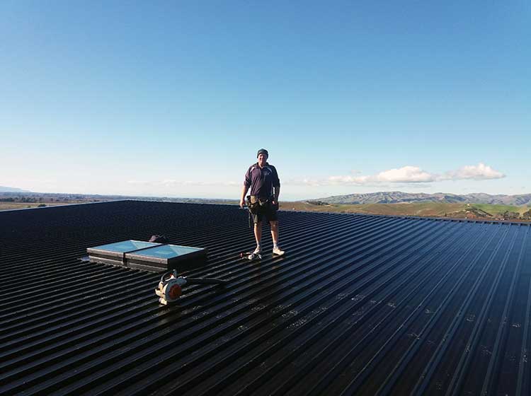 New long-run iron roof installed on a rural Canterbury building