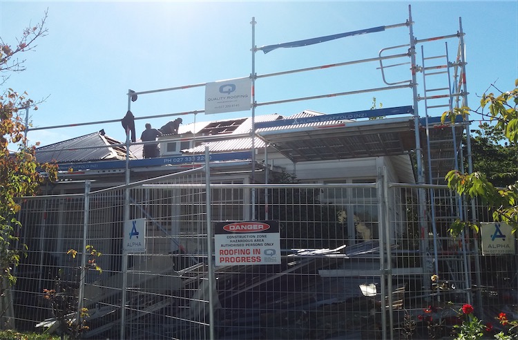 Full scaffold and edge protection on commercial reroofing project