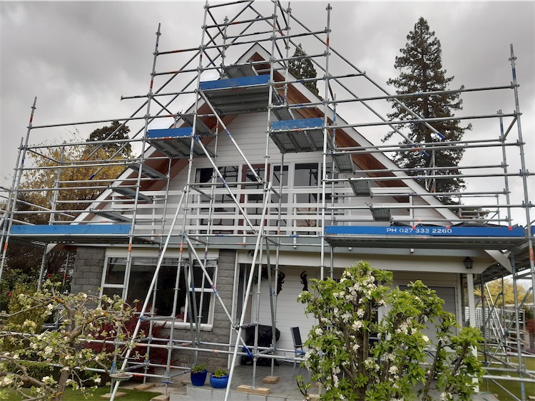 Edge protection rails installed around house reroof