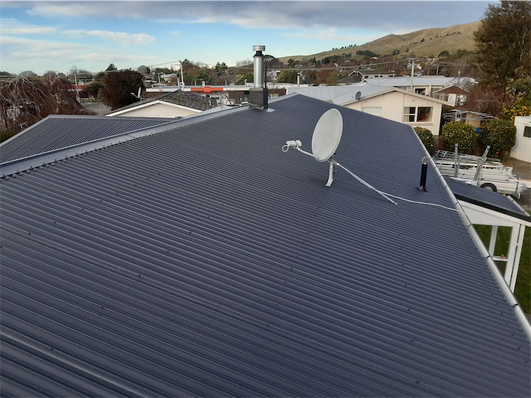 New long-run steel roof after reroofing