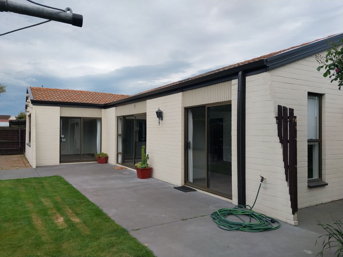 Single storey block home with completed external fascia and gutter