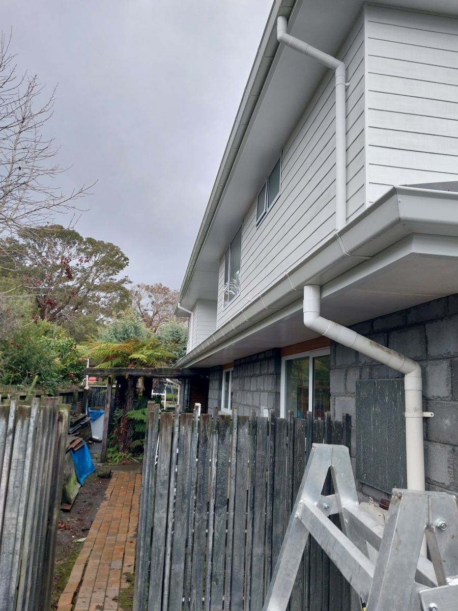 Straight finished soffit and gutter line on a two-storey home