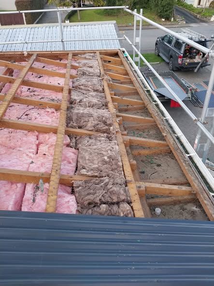 Gaps in ceiling insulation discovered during the reroof
